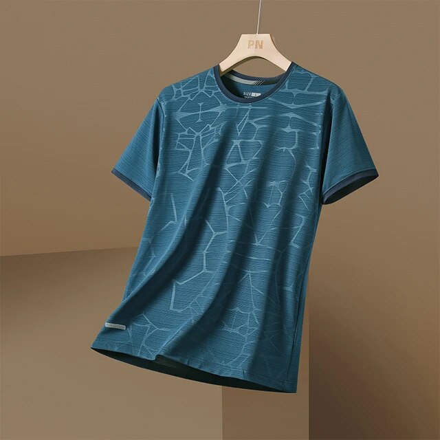 Blauwe Pro-Fit Sport T-shirt voor heren – Ademend, sneldrogend en lichtgewicht sportshirt met modern patroon. Perfect voor fitness, hardlopen en training. Comfortabele pasvorm en vochtafvoerend materiaal