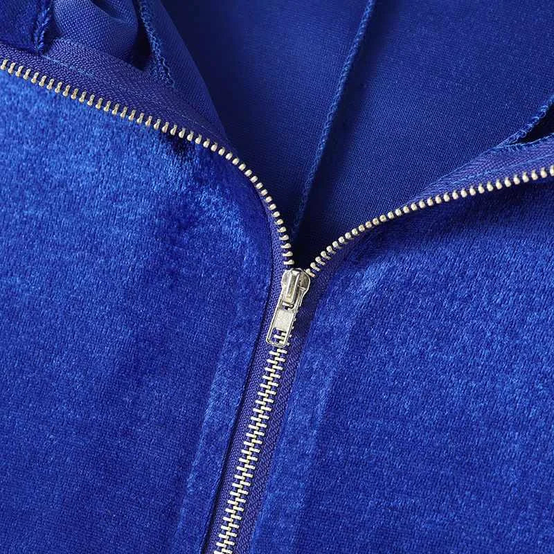 Luxe velours jumpsuit met patchwork