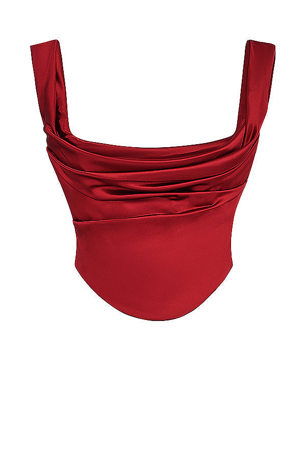 Tweedelige satijnen set met corset-top en schuine maxirok