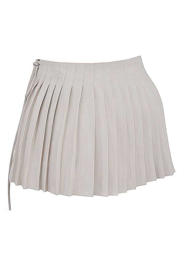 Witte geplooide crop top met beige overslag minirok