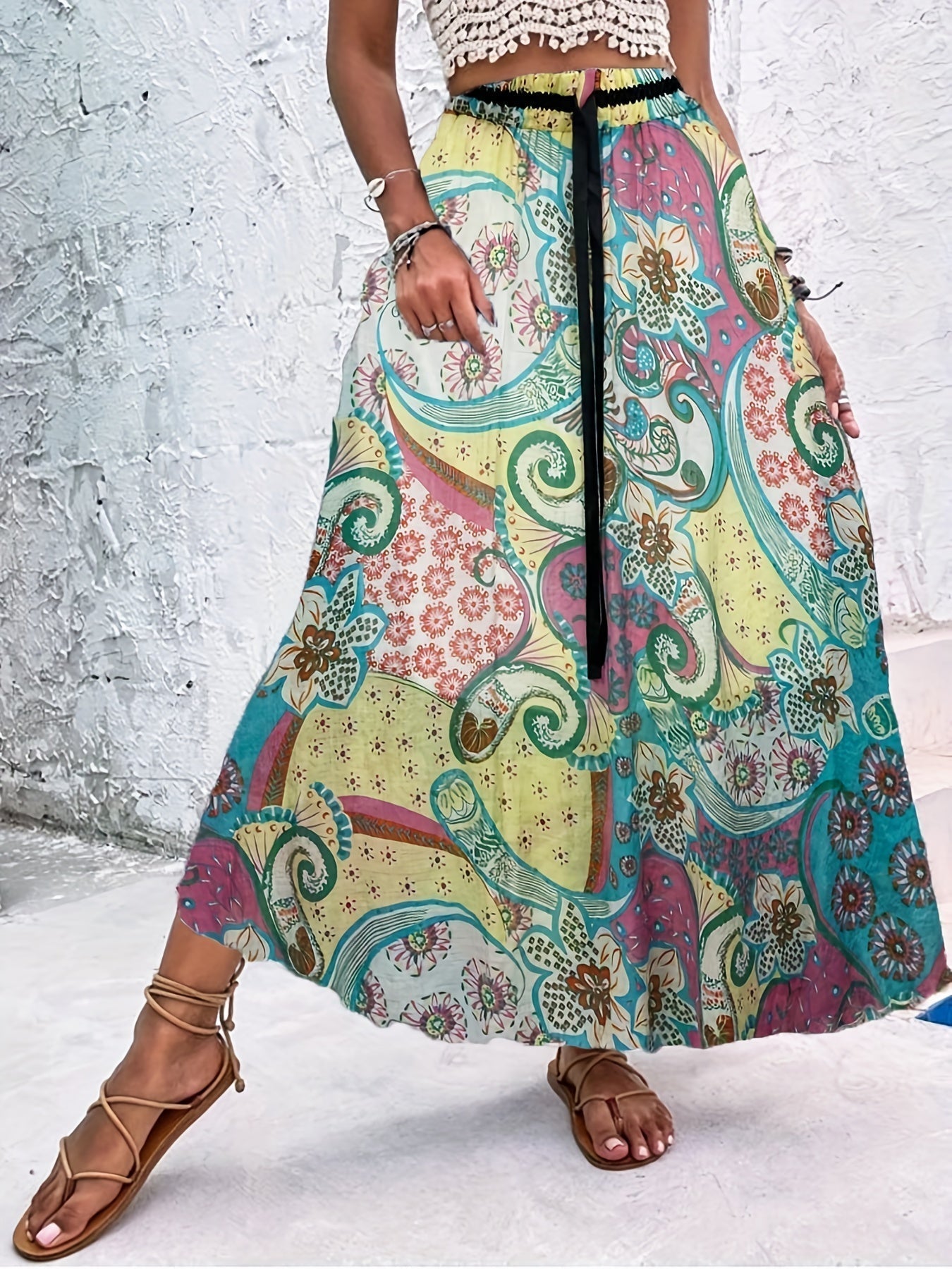 Zomerse maxi-rok met speelse stippen en strikdetail