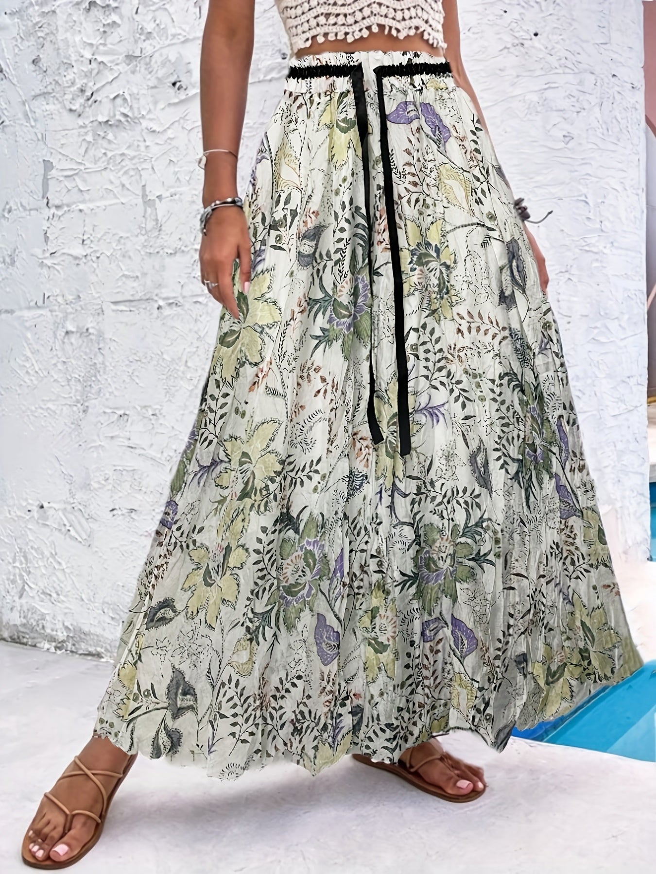 Zomerse maxi-rok met speelse stippen en strikdetail