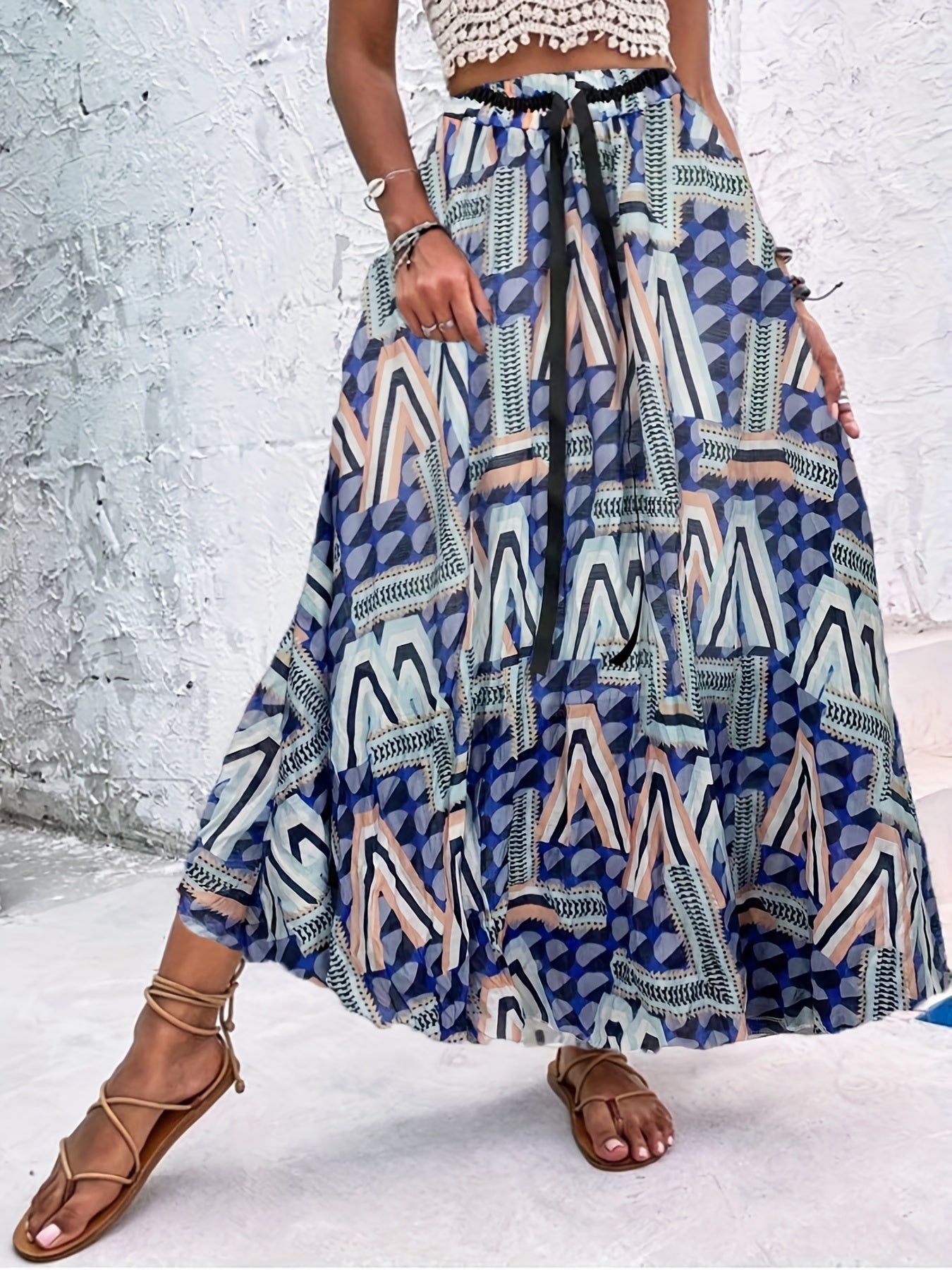 Zomerse maxi-rok met speelse stippen en strikdetail