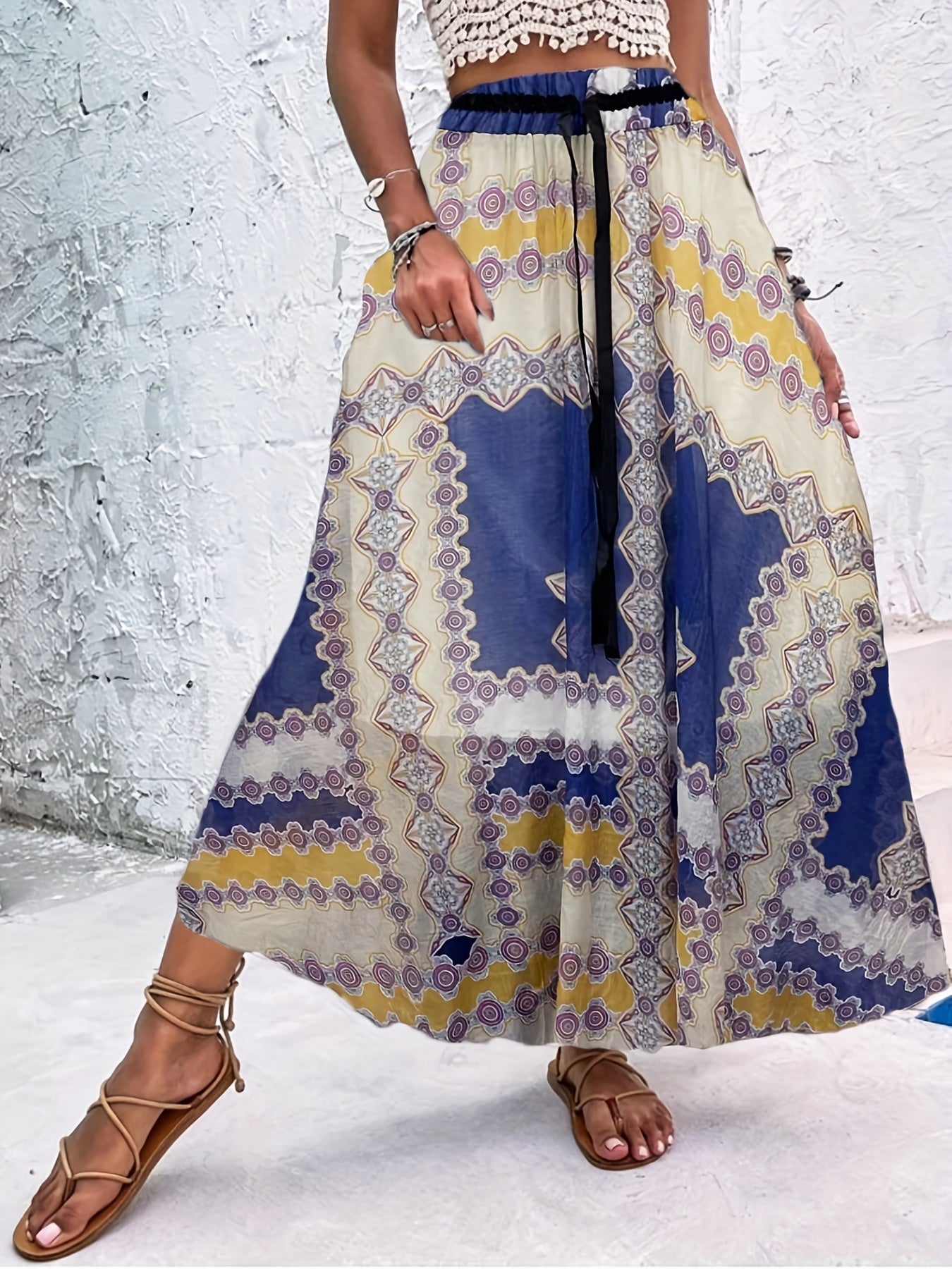 Zomerse maxi-rok met speelse stippen en strikdetail