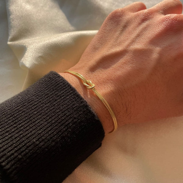 Minimalistische dames armband met knoop – elegant goudkleurig sieraad voor elke gelegenheid