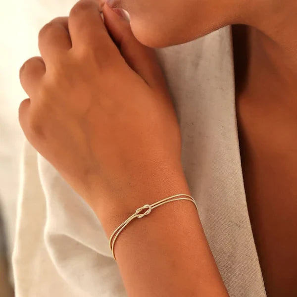 Minimalistische dames armband met knoop – elegant goudkleurig sieraad voor elke gelegenheid