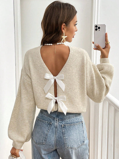 Elvire - Elegante Open-Back Trui met Strikdetails