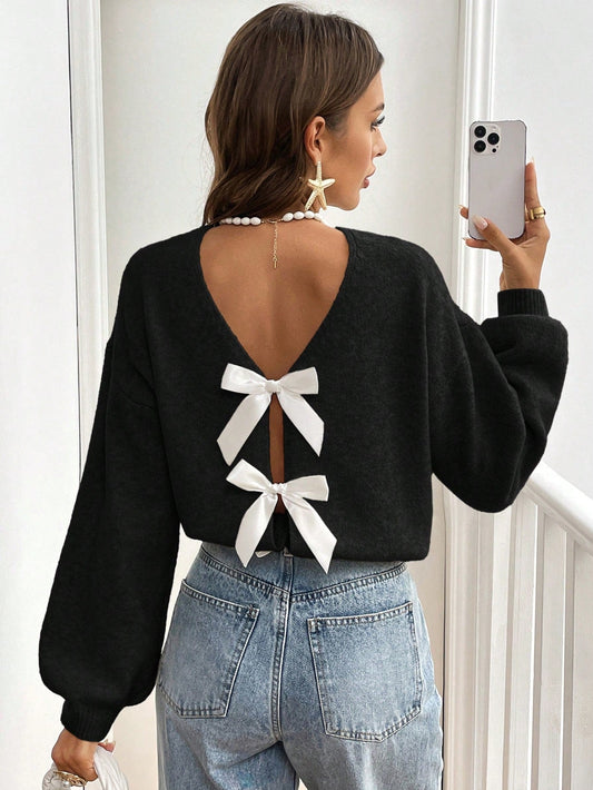 Elvire - Elegante Open-Back Trui met Strikdetails