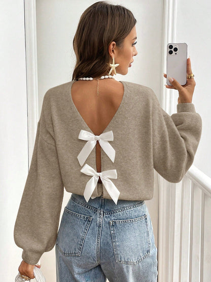 Elvire - Elegante Open-Back Trui met Strikdetails
