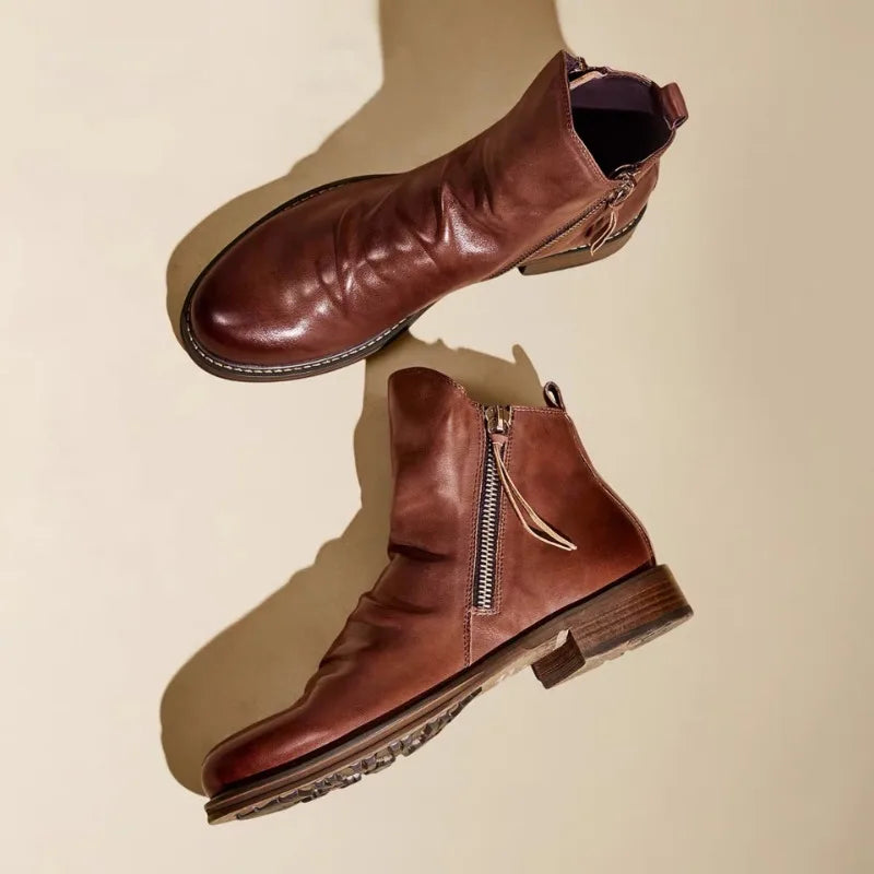 Heren Chelsea boots van echt leer met ritssluiting, luxe uitstraling en comfortabele pasvorm, ideaal voor formele en casual outfits.