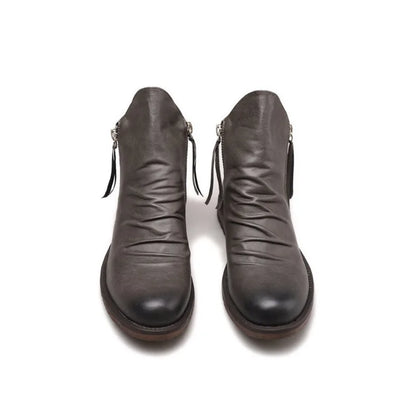 Heren Chelsea boots van echt leer met ritssluiting, luxe uitstraling en comfortabele pasvorm, ideaal voor formele en casual outfits.