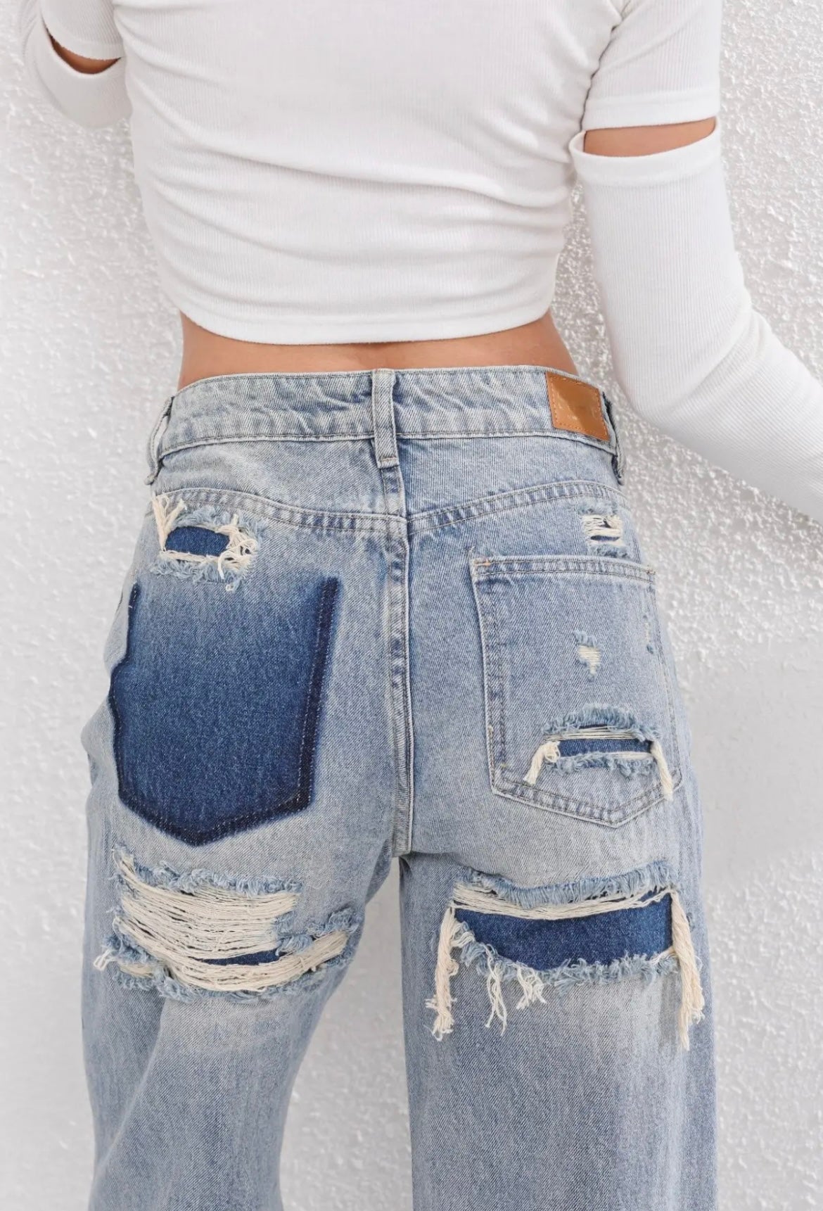Vintage Ripped Jeans met Uniek Patchwork Detail