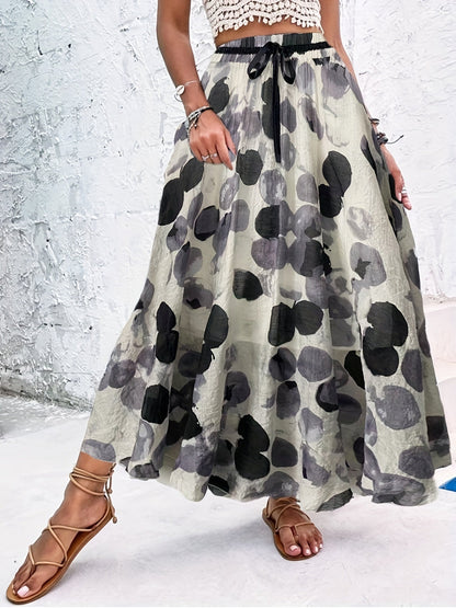 Zomerse maxi-rok met speelse stippen en strikdetail
