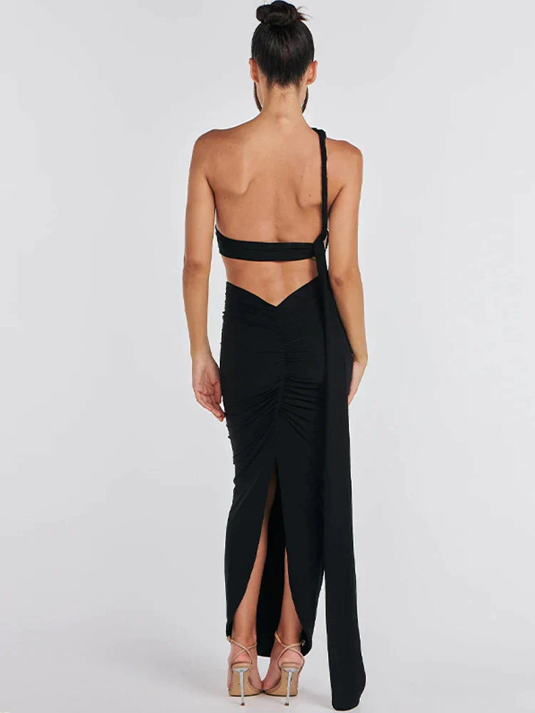 Zwarte asymmetrische crop top en maxi-rok set