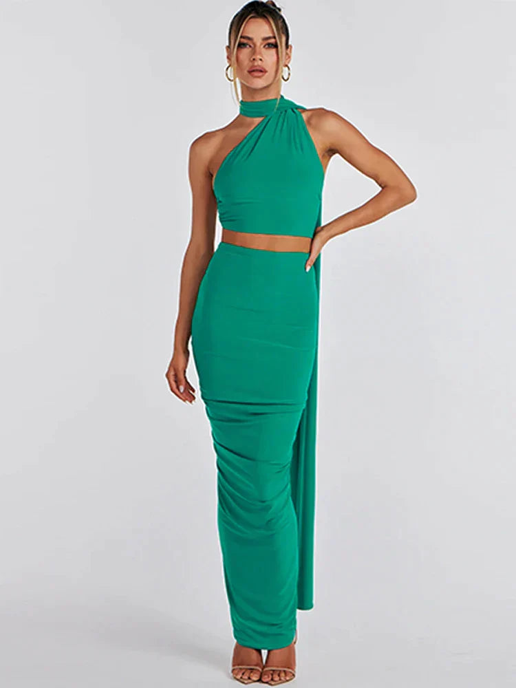 Zwarte asymmetrische crop top en maxi-rok set