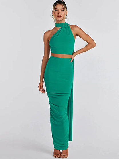 Zwarte asymmetrische crop top en maxi-rok set